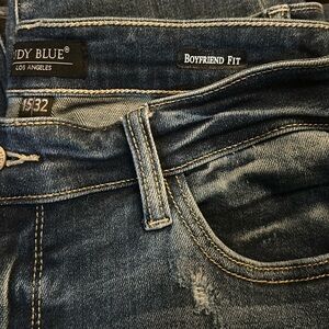 Coveted Judy Blue Mid Rise, Distressed, Double cuff boyfriend jeans.